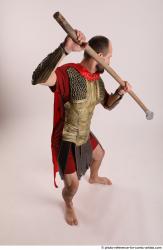 Man Adult Average White Fighting with spear Standing poses Casual